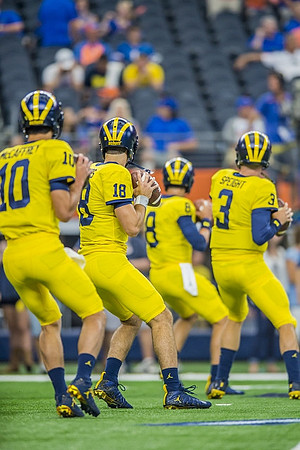 Dylan McCaffrey (10), Brandon Peters (18), John O'Korn (8), and Wilton Speight (3)