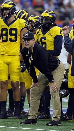 Ian Bunting (89), Jim Harbaugh, and Kareem Walker (6)