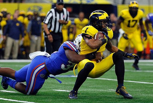 Kekoa Crawford (1) and Tyrone Wheatley Jr. (17)