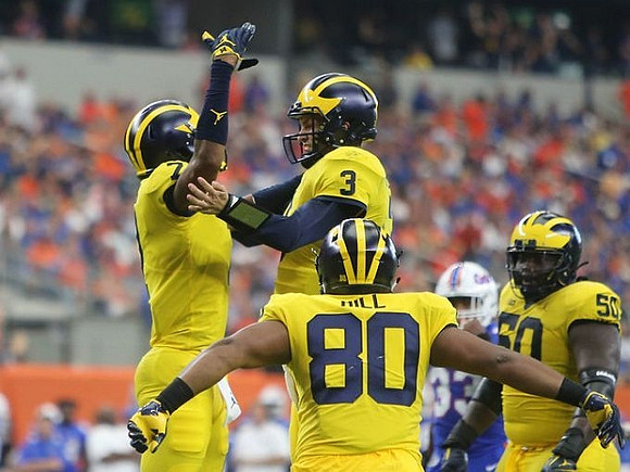 Tarik Black (7), Wilton Speight (3), Khalid Hill (80), and Michael Onwenu (50)