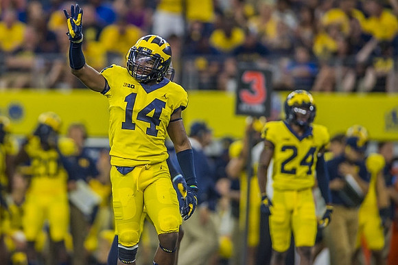 Josh Metellus (14) and Lavert Hill (24)