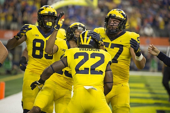 Maurice Ways (85), Karan Higdon (22), and Patrick Kugler (57)