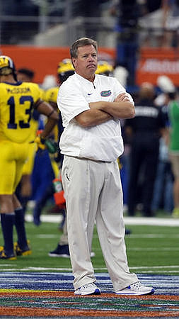 Eddie McDoom (13) and Florida Head Coach Jim McElwain
