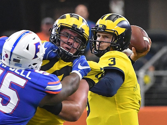 Ben Bredeson (74) and Wilton Speight (3)