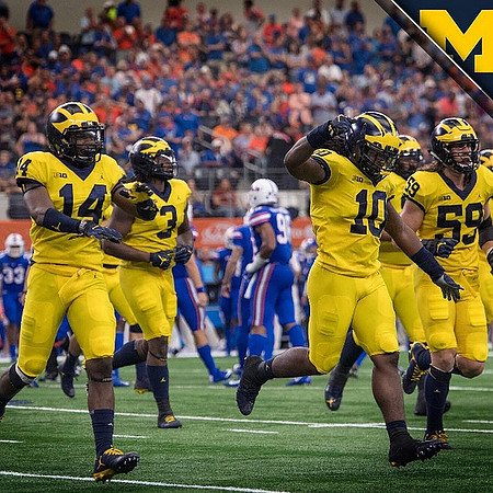 Josh Metellus (14), Rashan Gary (3), Devin Bush (10), and Noah Furbush (59)