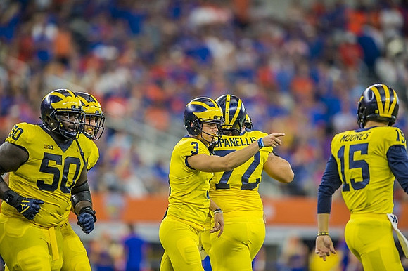Michael Onwenu (50), Quinn Nordin (3), Stephen Spanellis (72), and Garrett Moores (15)