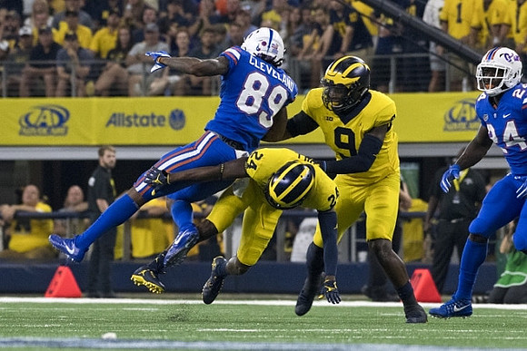 Lavert Hill (24) and Mike McCray (9)