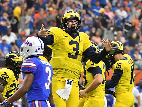 Karan Higdon (22), Wilton Speight (3), Ty Isaac (32), and Alex Malzone (15)