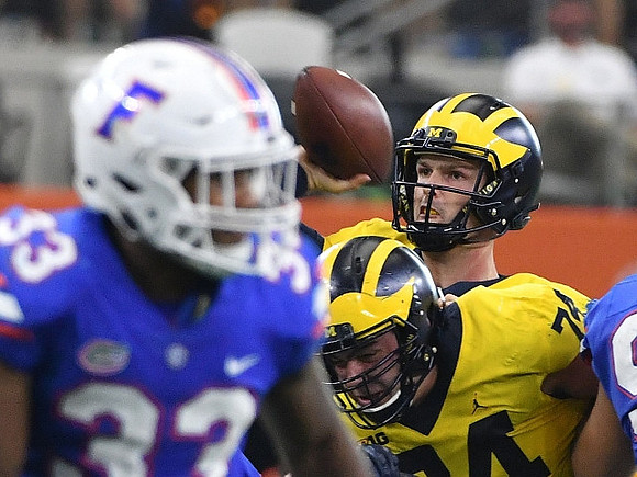 Ben Bredeson (74) and Wilton Speight (3)