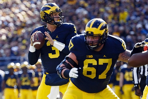 Wilton Speight (3) and Kyle Kalis (67)
