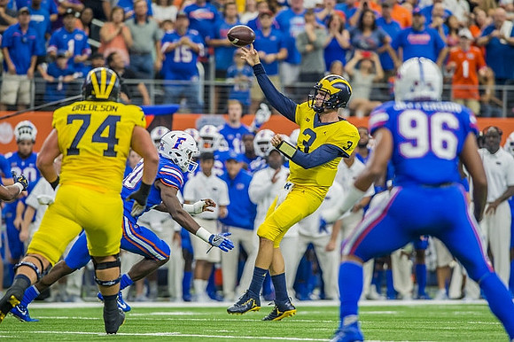 Ben Bredeson (74) and Wilton Speight (3)