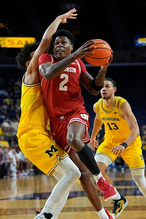 Terrance Williams II (5) and Olivier Nkamhoua (13)