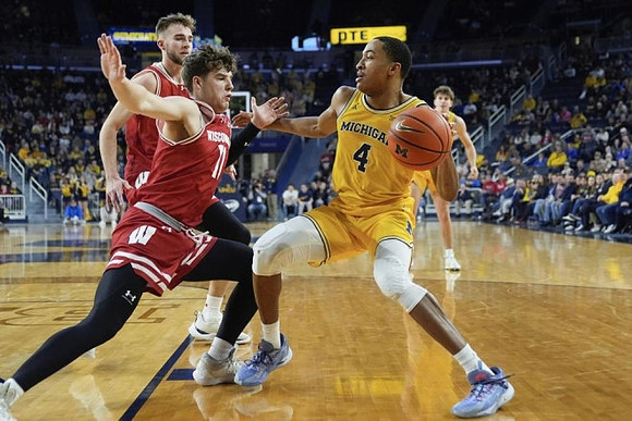 Nimari Burnett (4) and Will Tschetter (42)