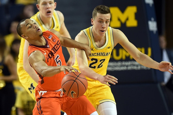 Moritz Wagner (13) and Duncan Robinson (22)