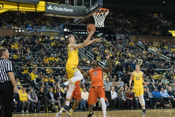 Moritz Wagner (13) and Duncan Robinson (22)