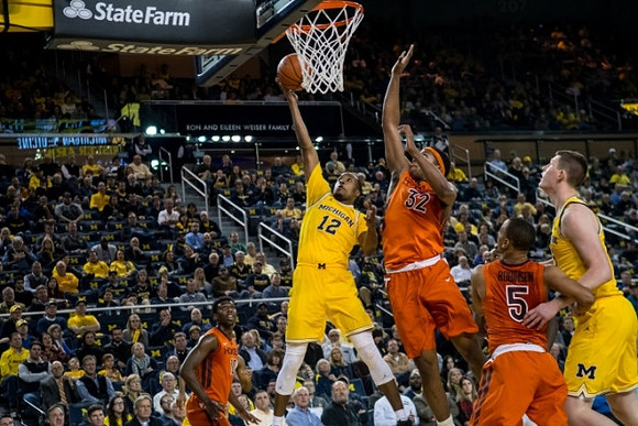 Muhammad-Ali Abdur-Rahkman (12) and Jon Teske (15)