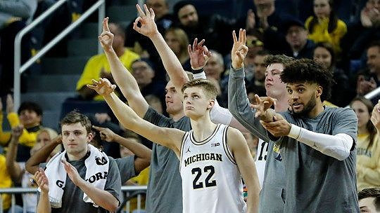 Luke Wilson (32), Jaron Faulds (44), Cole Bajema (22), Jon Teske (15), and Isaiah Livers (2)