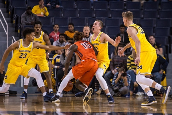 Ibi Watson (23), Derrick Walton Jr. (10), Duncan Robinson (22), and Moritz Wagner (13)
