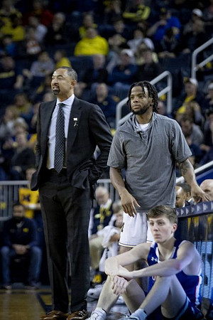 Juwan Howard and Zavier Simpson (3)