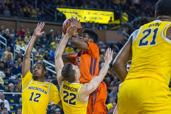 Muhammad-Ali Abdur-Rahkman (12), Duncan Robinson (22), and Zak Irvin (21)