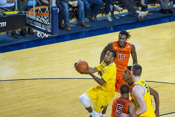 Muhammad-Ali Abdur-Rahkman (12) and Jon Teske (15)