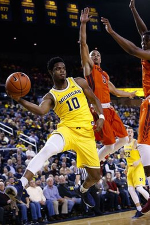 Derrick Walton Jr. (10) and Duncan Robinson (22)