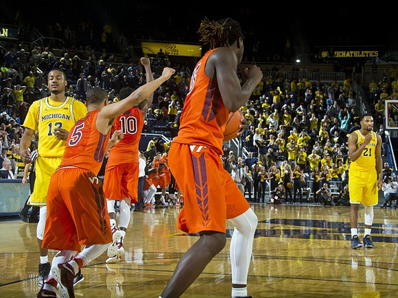 Muhammad-Ali Abdur-Rahkman (12) and Zak Irvin (21)