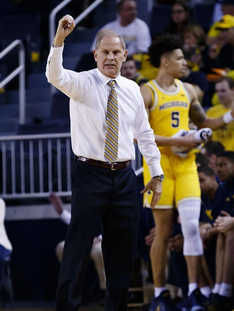 John Beilein and D.J. Wilson (5)