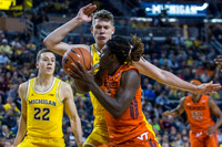 Duncan Robinson (22) and Moritz Wagner (13)