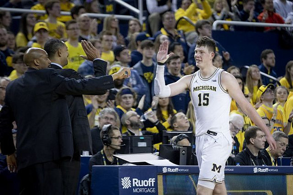 Saddi Washington, Juwan Howard, and Jon Teske (15)
