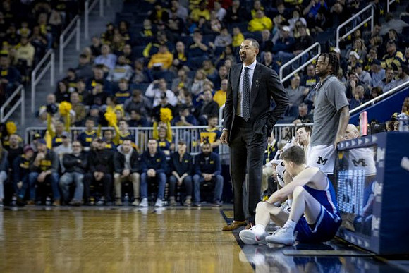 Juwan Howard and Zavier Simpson (3)