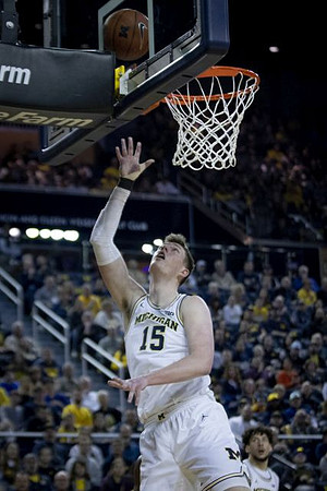 Jon Teske (15) and Brandon Johns Jr. (23)