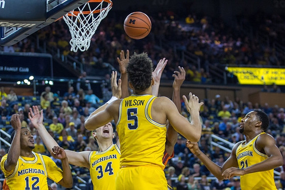 Muhammad-Ali Abdur-Rahkman (12), Mark Donnal (34), D.J. Wilson (5), and Zak Irvin (21)