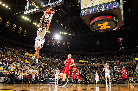 Aubrey Dawkins (24), Derrick Walton Jr. (10), Mark Donnal (34), and Duncan Robinson (22)