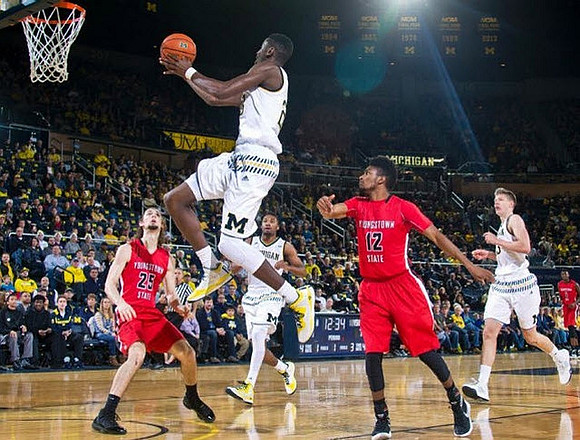 Caris LeVert (23), Zak Irvin (21), and Moritz Wagner (13)