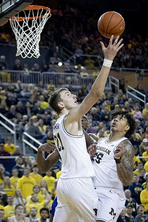 Franz Wagner (21) and Eli Brooks (55)