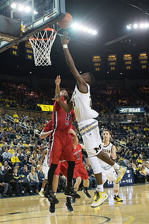 Caris LeVert (23) and Mark Donnal (34)