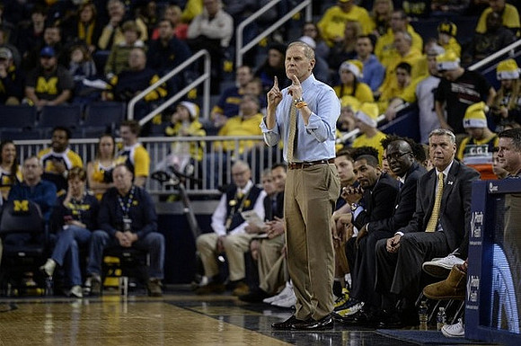 John Beilein, LaVall Jordan, Bacari Alexander, and Jeff Meyer
