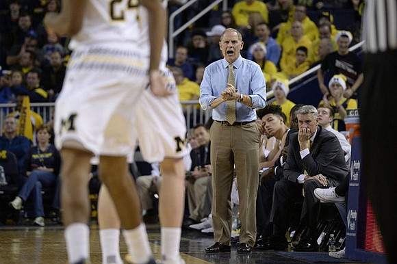 John Beilein, D.J. Wilson (5), and Jeff Meyer