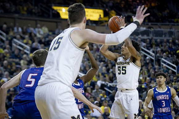 Jon Teske (15) and Eli Brooks (55)