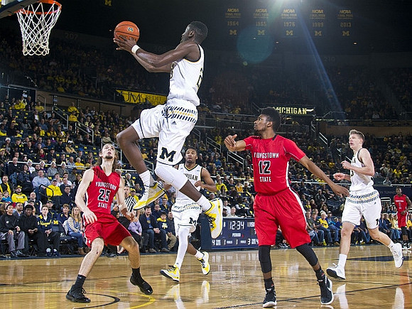 Caris LeVert (23), Zak Irvin (21), and Moritz Wagner (13)