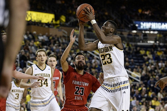 Kameron Chatman (3), Mark Donnal (34), and Caris LeVert (23)