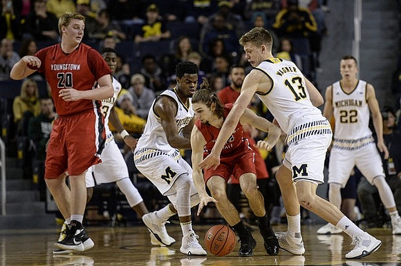 Caris LeVert (23), Derrick Walton Jr. (10), Moritz Wagner (13), and Duncan Robinson (22)