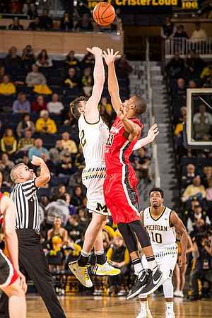 Ricky Doyle (32) and Derrick Walton Jr. (10)