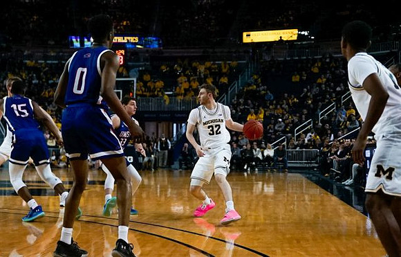 Cole Bajema (22) and Rico Ozuna-Harrison (14)