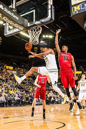 Zak Irvin (21) and Duncan Robinson (22)