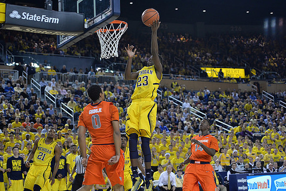 Zak Irvin (21) and Caris LeVert (23)
