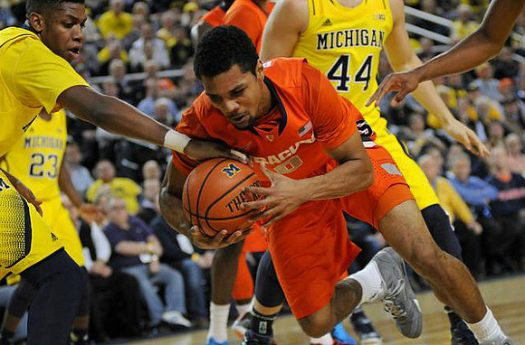 Kameron Chatman (3), Caris LeVert (23), and Max Bielfeldt (44)