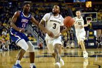 Zavier Simpson (3) and Austin Davis (51)