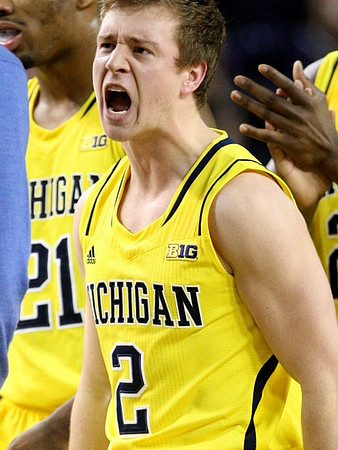 Zak Irvin (21) and Spike Albrecht (2)